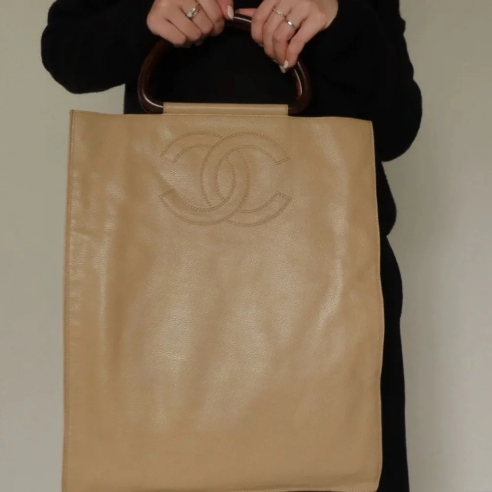 Authentic CHANEL beige caviar leather CC tortoise top handle satchel bag